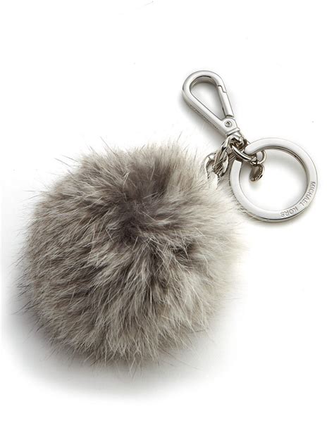 michael kors leather pom pom keychain|MICHAEL Michael Kors Fur Pom Pom Keychain .